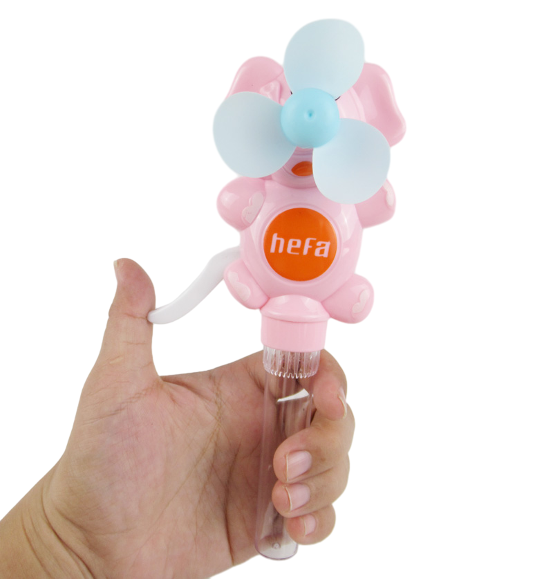 candy toy with pig hand pressed fan